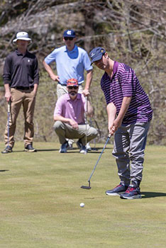 picture of KC playing golf