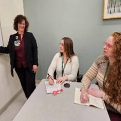 APP Fellows and an instructor in a classroom