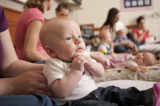 Baby with parent at WHRC event