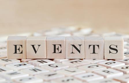 Letter tiles spelling out the word events