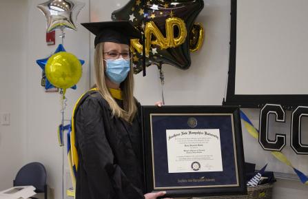 Katie Smith with diploma