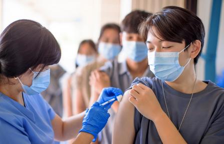 Teen getting vaccination