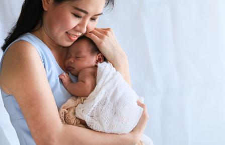 Woman holding baby