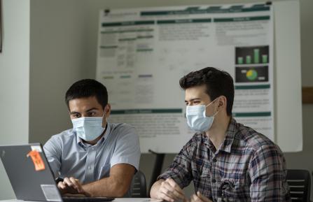 picture of interns at desk