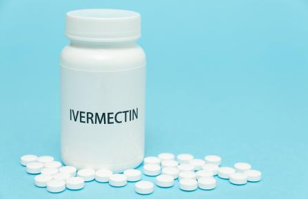Ivermectin pill bottle and pills