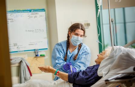 Nurse helping an elderly patient