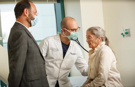 Photo of doctors and patient.