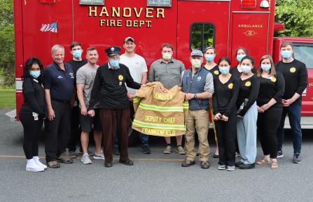 picture of Dermatology team and firefighters