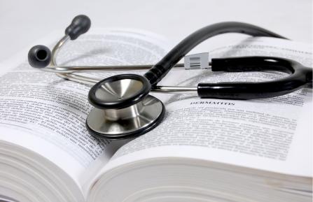 photo of stethoscope and book