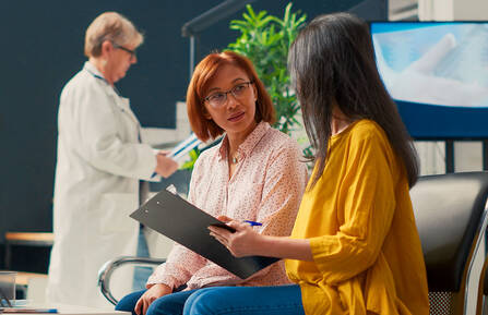 picture of woman talking to interpreter