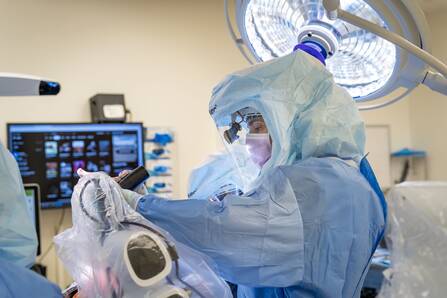 Surgeon Wayne Moschetti using a new robotic-assisted surgical tool.