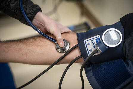 Nurse taking blood pressure