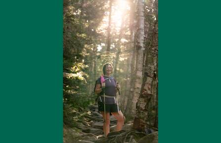 Bariatric surgery patient Krystal Kebler is shown on a hike in the woods.
