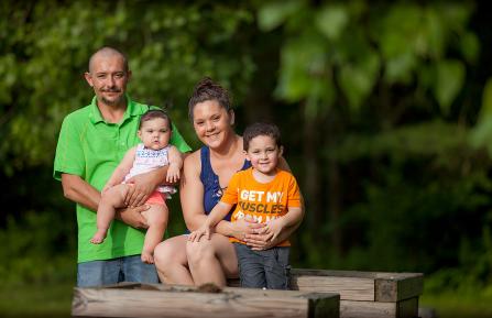 Ashley Raymond with her husband and children