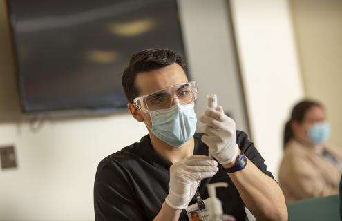 vaccine being drawn for shot