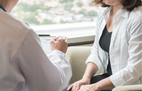 Doctor talking to a women
