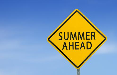 yellow road sign that says summer ahead