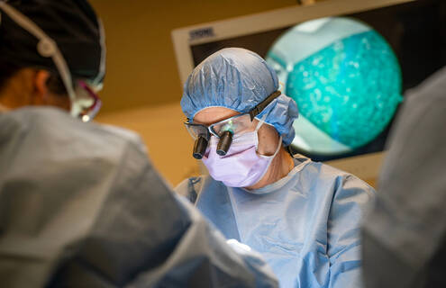 Orthopaedic surgeon Lance G. Warhold, MD, during a carpal tunnel release surgery.   