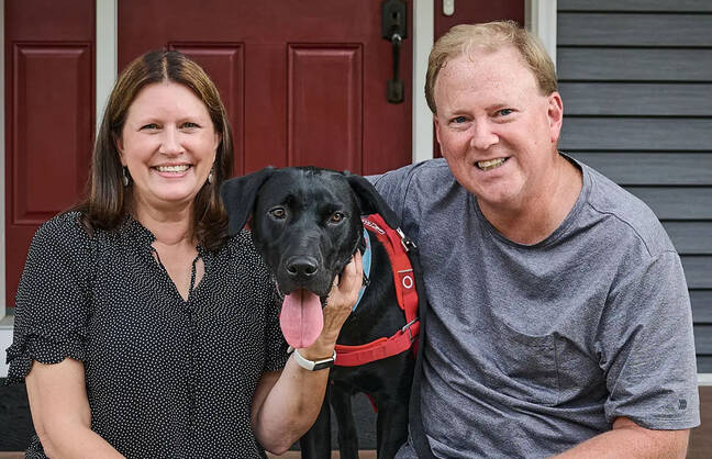 Lisa and Jeff Clark with their dog