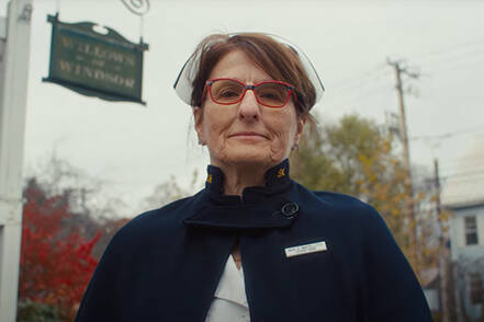 Susan Januszewski, Cardiac patient, stands outside in her nurse uniform