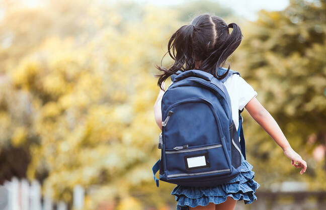 Child running to school