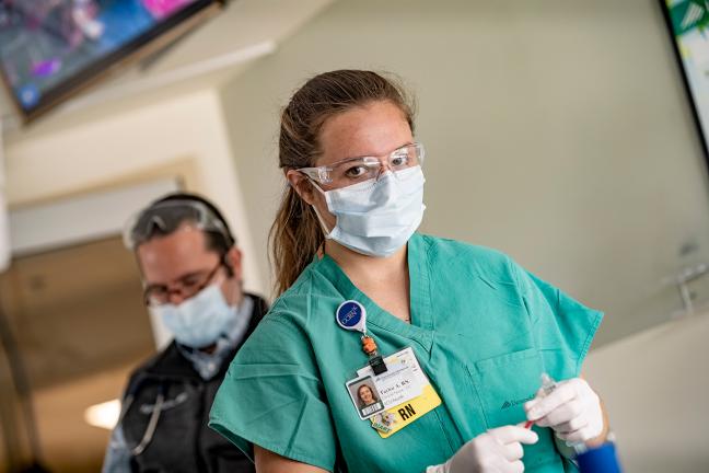 Nurses wearing surgical masks at DHMC and Clinics