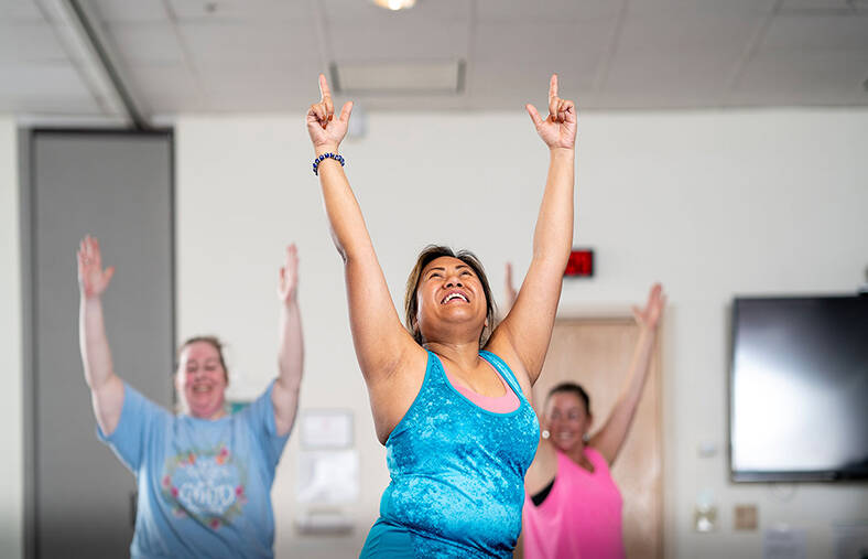 Employees at yoga class
