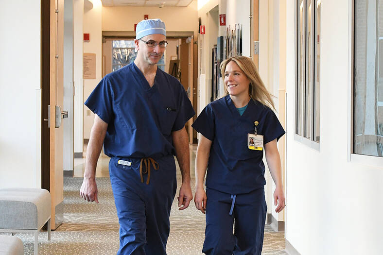 Dartmouth Health caregivers walking in a hallway