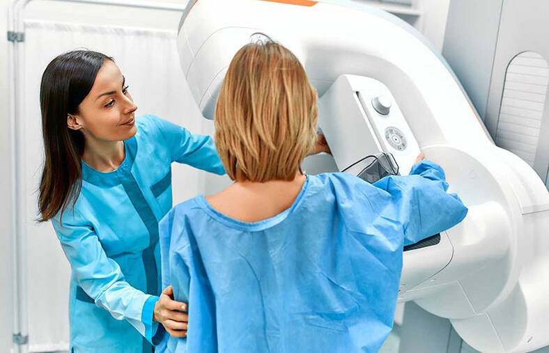 A patient undergoes a screening procedure for a mammogram
