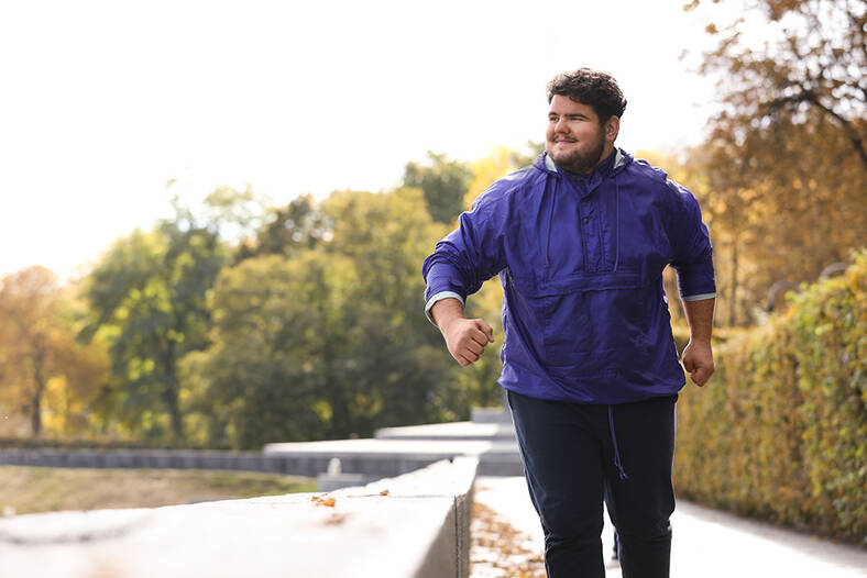 Weight Center: Health activities, man jogging in a park