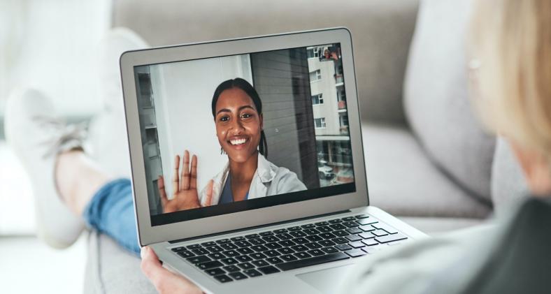 Virtual visit with doctor on laptop